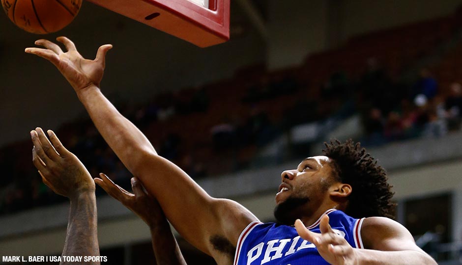 76ers center Jahlil Okafor shoots the ball against Boston Celtics forward Amir Johnson during the first half at Verizon Wireless Arena.