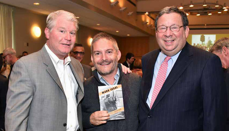 John J. "Johnny Doc" Dougherty, Business Manager of Local 98, Chris Bartlett Executive Director of William Way, and David L. Cohen, Senior Executive Vice President of Comcast Corporation. When Cohen took the podium to pay tribute to Segal, he stated that the only person who bought more books for his "workers' was Dougherty. His two biggest fans.