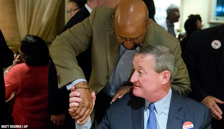 Outgoing Philadelphia Michael Nutter, top, greets and former City Councilman Jim Kenney, Tuesday, Nov. 3, 2015, at the Relish restaurant in Philadelphia. 