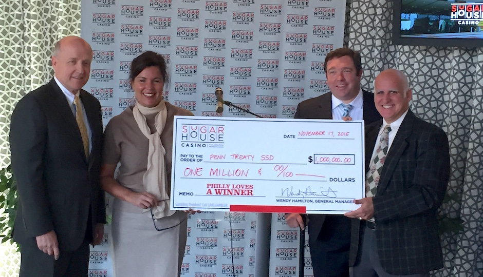 Left to right: Rich Levins, vice chairman of PTSSD; Wendy Hamilton, general manager of SugarHouse Casino; A.J. Thomson, president of the Friends of Penn Treaty Park; and Rich Angeli, chairman of the PTSSD | Image courtesy of SugarHouse Casino