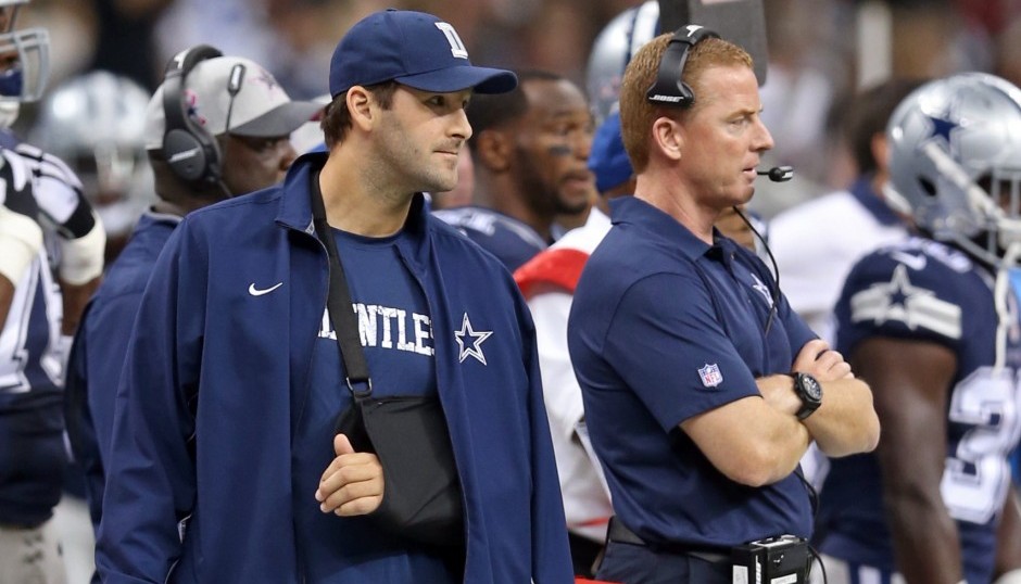 Tony Romo and Jason Garrett. (USA Today Sports)
