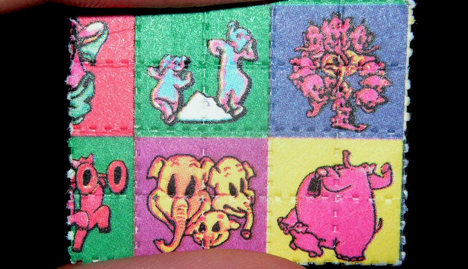 "Pink Elephants on Parade Blotter LSD Dumbo" by Psychonaught - Own work. Licensed under Public Domain via Wikimedia Commons.