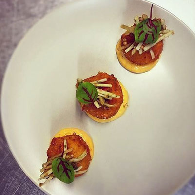 Celery root croquettes w/ remoulade + herby apple slaw | Photo by George Sabatino