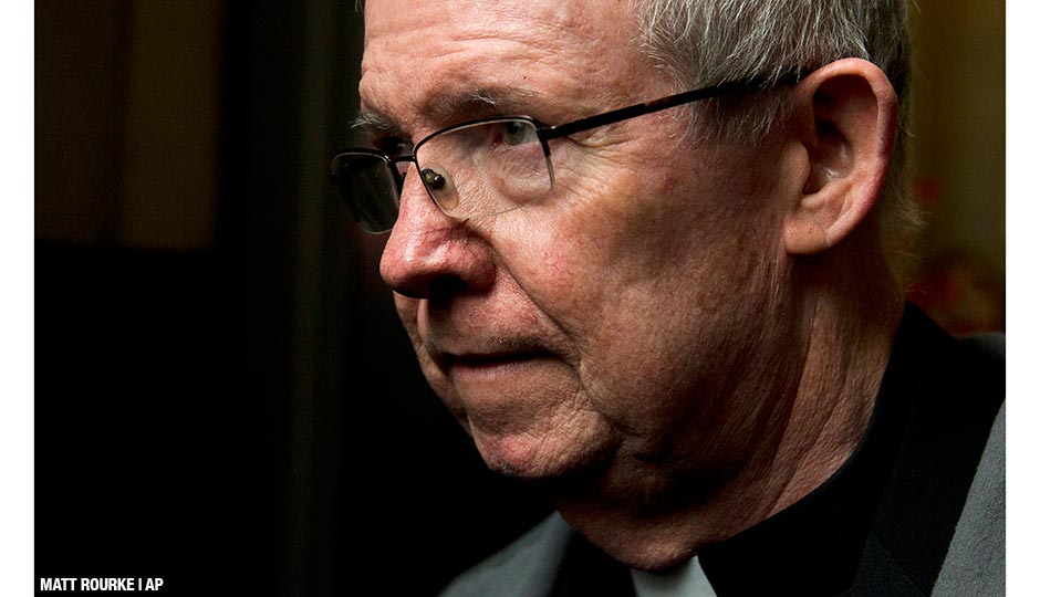 In this Jan. 6, 2014 file photo, Monsignor William Lynn walks from the criminal justice center in Philadelphia. The landmark conviction of the Roman Catholic church official imprisoned over his handling of abuse complaints in Philadelphia has been overturned for the second time. A Superior Court ruling, Tuesday, Dec. 22, 2015 awarded Lynn a new trial. 