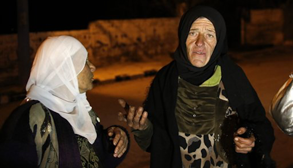 Residents of the besieged village of Madaya in Syria, where Philadelphia resident Hussein Assaf says his family is stranded. (AP Photo)