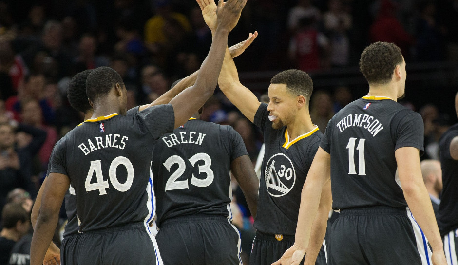 Golden State Warriors forward Harrison Barnes (40) is congratulated after hitting the game winning shot against the Philadelphia 76ers at Wells Fargo Center. 108-105 | Bill Streicher-USA TODAY Sports