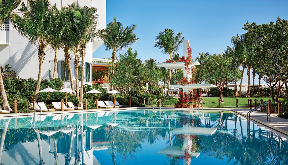A pool at the  Miami Beach Edition. Photograph by Nikolas Koenig.