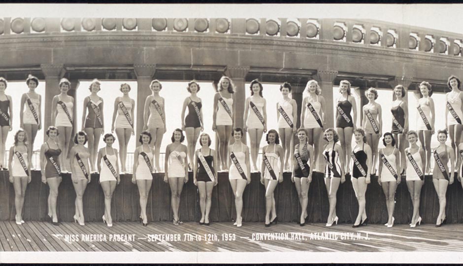 "Miss America 1953 swimsuit competition" by Fred Hess & Son - This image is available from the United States Library of Congress's Prints and Photographs division under the digital ID pan.6a24762.This tag does not indicate the copyright status of the attached work. A normal copyright tag is still required. See Commons:Licensing for more information. العربية | čeština | Deutsch | English | español | فارسی | suomi | français | magyar | italiano | македонски | മലയാളം | Nederlands | polski | português | русский | slovenčina | slovenščina | Türkçe | українська | 中文 | 中文（简体）‎ | 中文（繁體）‎ | +/−. Licensed under Public Domain via Wikimedia Commons.