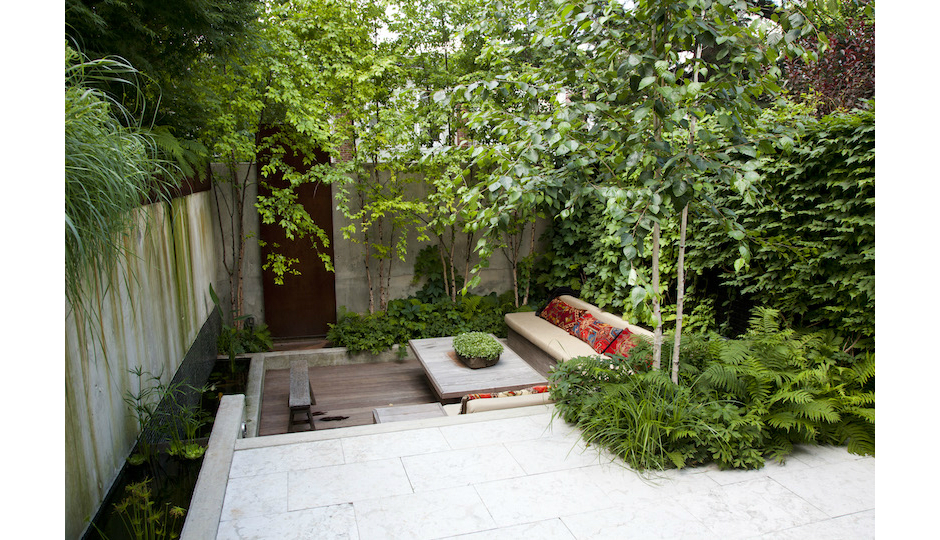 The sunken garden in the rear of the home is one of many delightful green features built into the home. Photo | Laura Kivey via Marion Dinofa, BHHS Fox & Roach - Bryn Mawr 