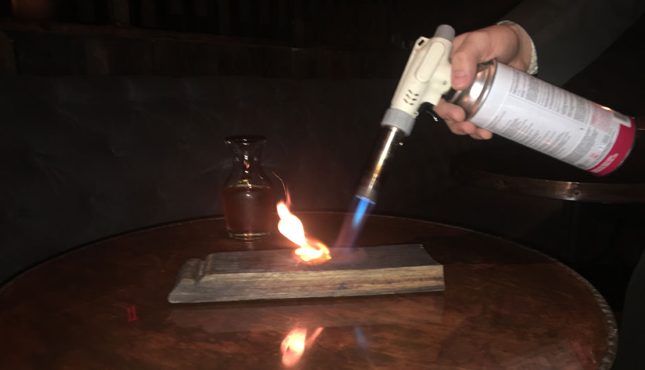 Torching the cinnamon and clove.