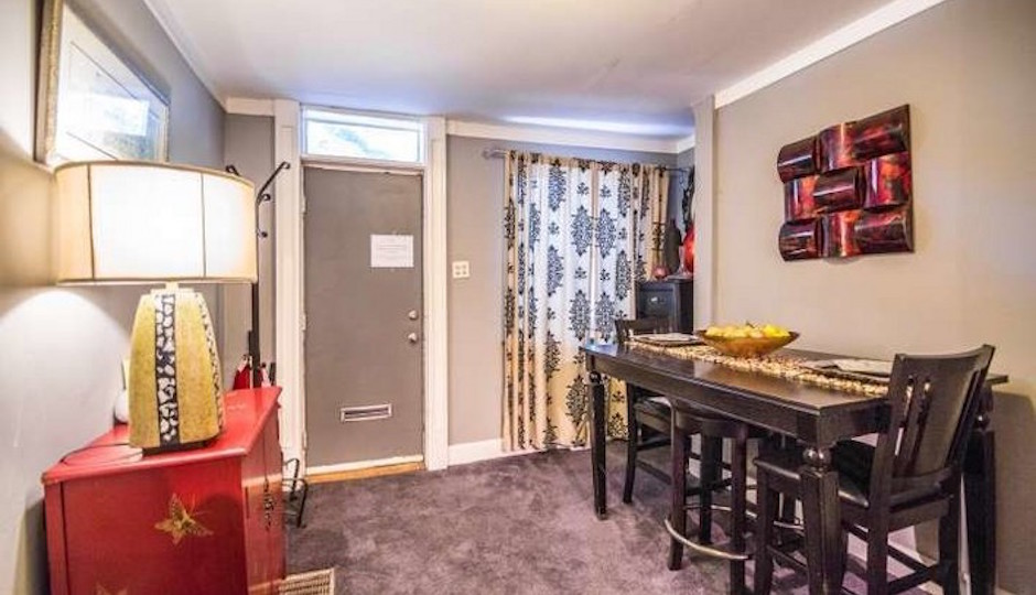 This home's current owner uses the first floor space as a dining/sitting room.