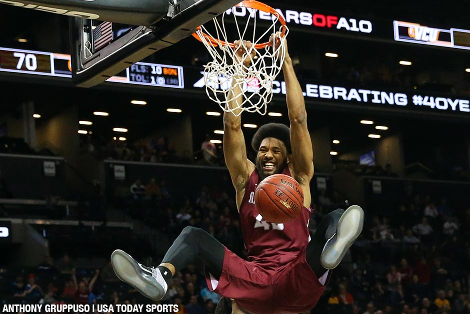 Saint Joseph's Hawks forward DeAndre Bembry (43) dunks during the second half against the Virginia Commonwealth Rams the championship of the Atlantic 10 conference tournament at Barclays Center. 