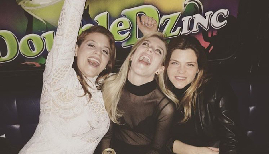 Bachelorette Genine MacMullen (left) and friends party inside Double Dz party bus on Saturday night. 