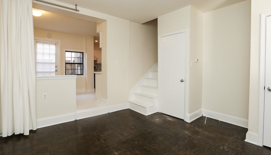 The kitchen and living room at 1105 S Bodine St.