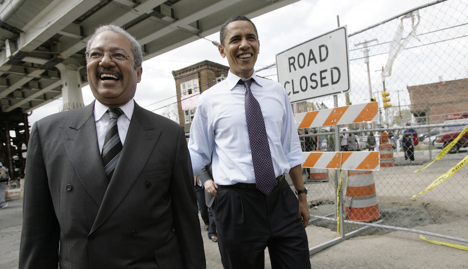 Democratic presidential hopeful, Sen. Barack Obama, D-Ill., center, walks with Rep. Chaka Fattah, D-Pa., left, in Philadelphia, Tuesday, April 22, 2008. (AP Photo/Jae C. Hong)