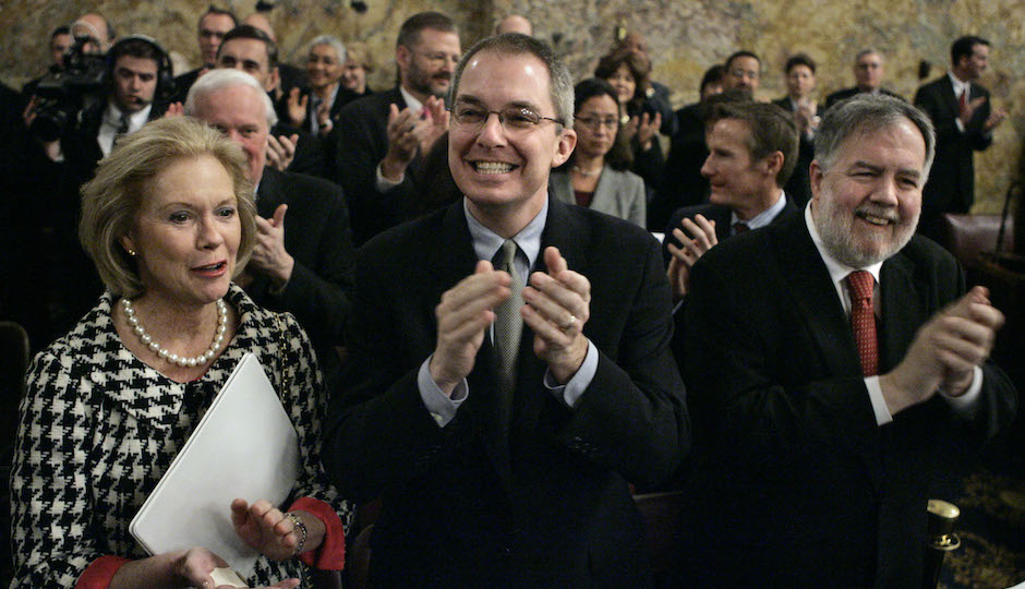 Pennsylvania's first lady, Midge Rendell, left; Gov. Ed Rendell's chief of staff John Estey, center; and budget secretary Mike Masch applaud as Gov. Ed Rendell enters to deliver his yearly state budget address to a joint session of the Pennsylvania House of Representatives and Senate at the Capitol in Harrisburg, Pa., Tuesday, Feb. 6, 2007. (AP Photo/Carolyn Kaster)