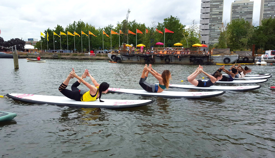 SUP Yoga at Spruce Street Harbor Park | Photo via Facebook