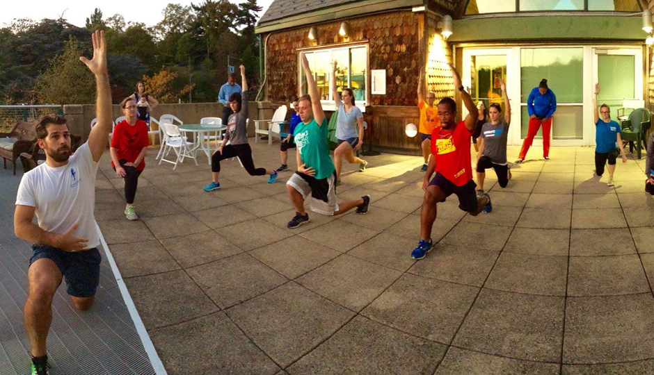 Charge owner Charles Scogna leading a pop-up group class | Photo via Facebook 