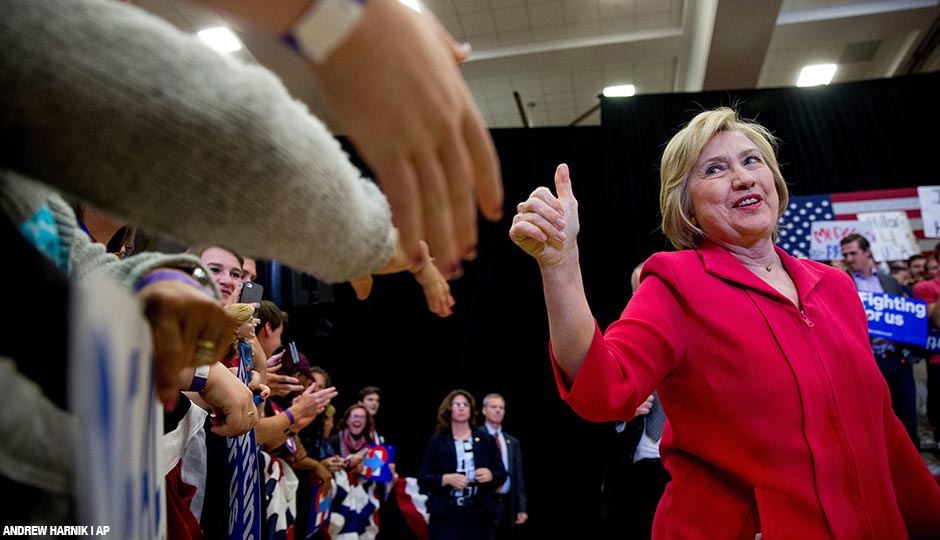 Democratic presidential candidate Hillary Clinton, center, arrives to speak at a get out the vote event at Transylvania University in Lexington, Ky., Monday, May 16, 2016.