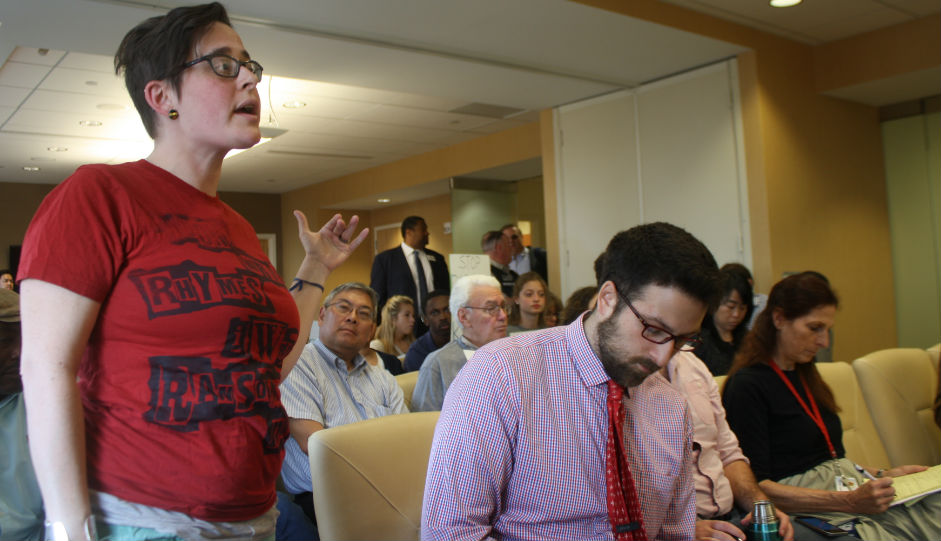 Hannah Sassaman of the Media Mobilizing Project address the Parking Authority. Photo by Jared Brey.