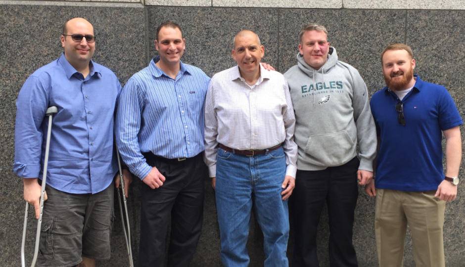 Robert Hewett (center) finally met the first responders who saved him from the 2015 Amtrak derailment in Philadelphia. (Courtesy Robert Mongeluzzi)