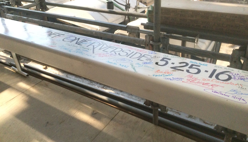 The beam guests signed at the ceremony may be purely symbolic, as One Riverside's frame is largely complete, but it symbolizes years of planning and construction as well as the last piece in the transformation of the Schuylkill riverbank from dump to jewel. | Photos: Sandy Smith