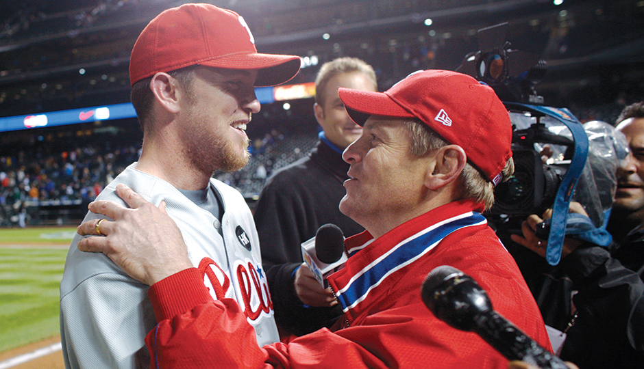 Closer Brad Lidge and John Middleton embrace after winning the 2009 NLDS | Photograph by David Zalubowski/Associated Press