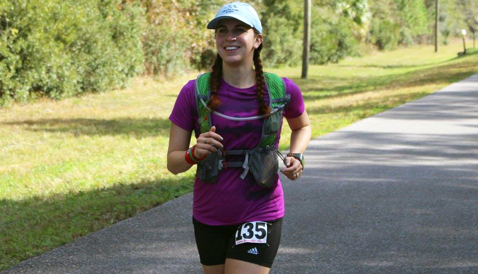 Rebecca Barber, running with her signature braided pigtails. 