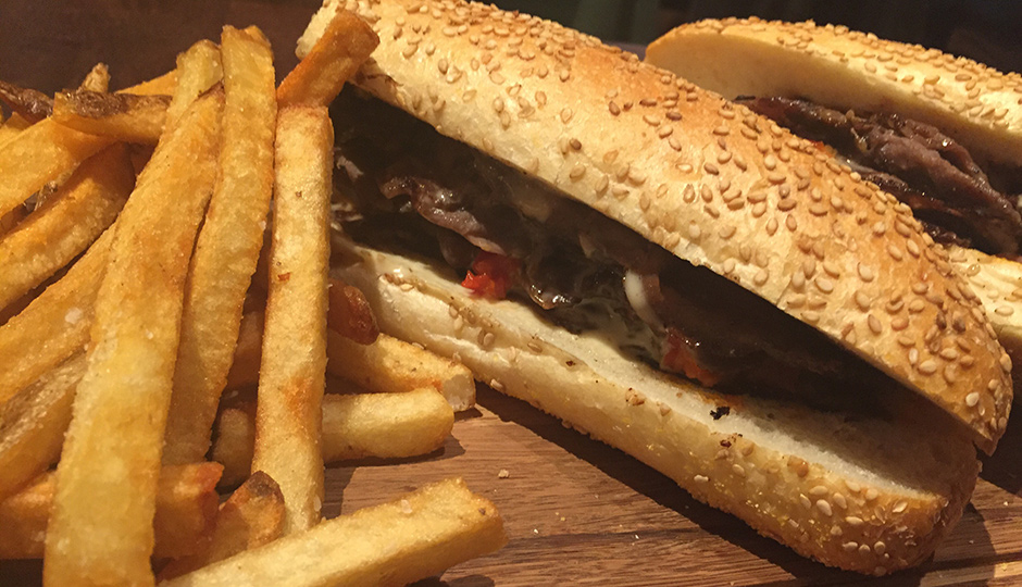 Brisket sandwich at Stove & Tap | Photo by Craig Slotkin