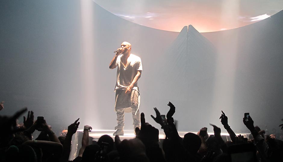 Kanye West performing in 2013