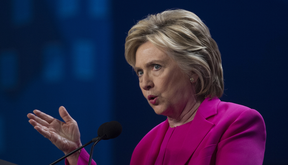 Presumptive democratic presidential nominee Hillary Clinton addresses the The National Education Association (NEA) Representative Assembly in Washington D.C., Tuesday, July 5, 2016. (AP Photo/Molly Riley)