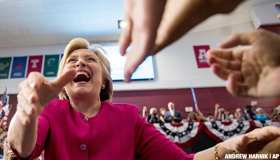 Democratic presidential candidate Hillary Clinton greets supporters as she arrives for a rally at McGonigle Hall at Temple University in Philadelphia , Friday, July 29, 2016. Clinton and Kaine will begin a three day bus tour. 