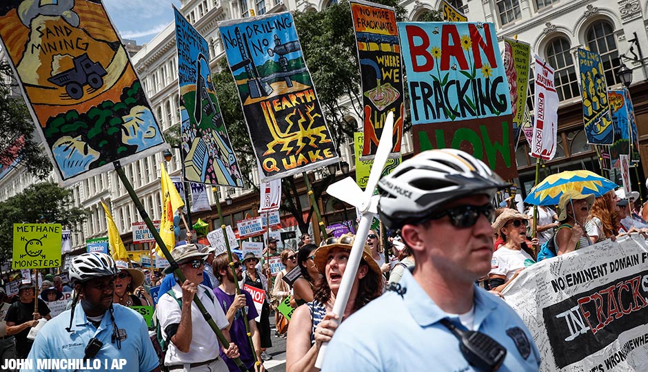 Supporters of Sen. Bernie Sanders, I-Vt., march alongside Philadelphia police during a protest on Sunday, July 24.