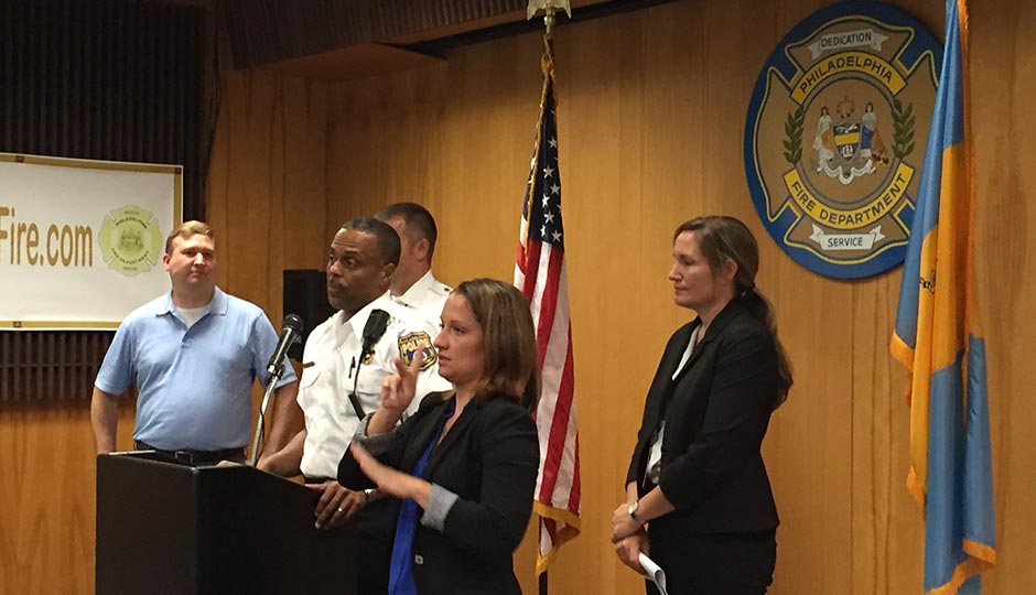 Police Commissioner Richard Ross (center) discusses protest marches on the first day of the DNC.