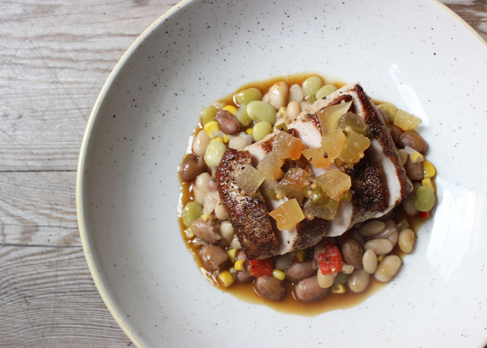 Berkshire Pork Steak - pork flat iron steak, lima, navy and cranberry bean succotash, bacon jus, watermelon rind mostarda | Photo by Vanessa Beahn