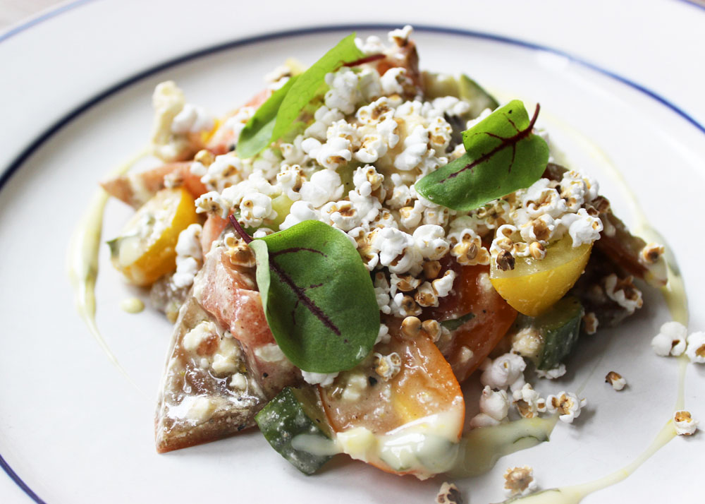 Heirloom Tomato Salad - Marinated cucumbers, feta cheese, popped sorghum, mint