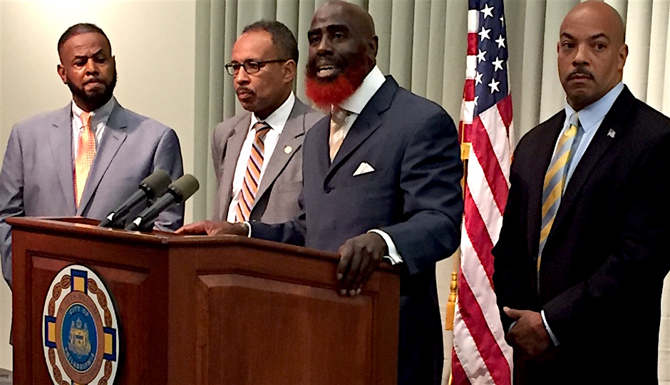 Defense attorney Tariq Karim El-Shabazz (center) will become District Attorney Seth Williams's top deputy. 