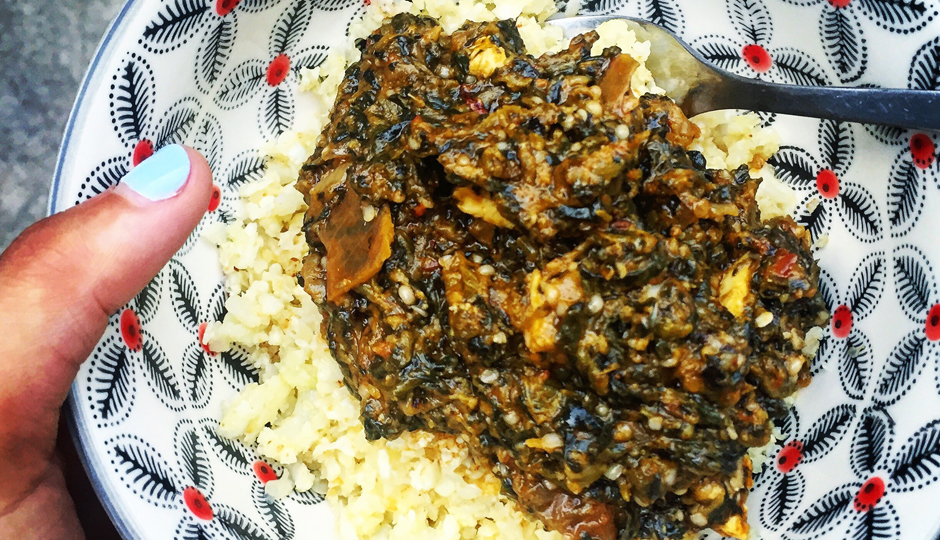 Cauliflower rice topped with Saag Paneer 