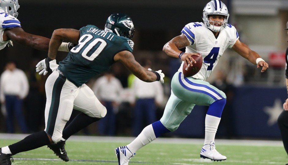 Marcus Smith and Dak Prescott. (USA Today Sports)