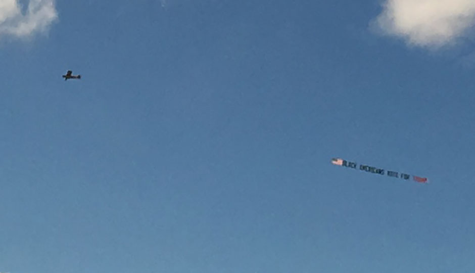 "Black Americans vote for Trump" on a banner