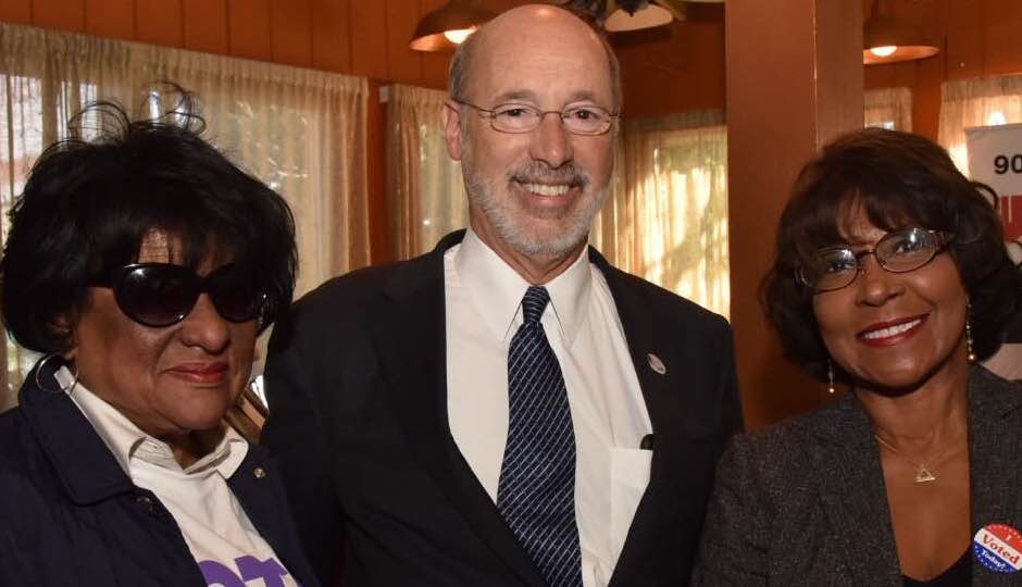 City Councilwomen Jannie Blackwell (left) and Blondell Reynolds Brown (right) flank Gov. Tom Wolf. (Photo: HughE Dillon