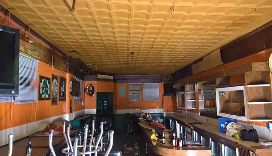 Above the drop ceiling, the original tin ceiling.