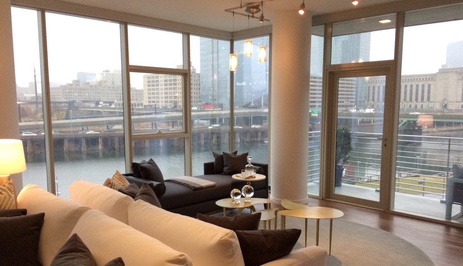 The living room in Unit 412, one of two finished model units at One Riverside. | Photos: Sandy Smith unless otherwise indicated