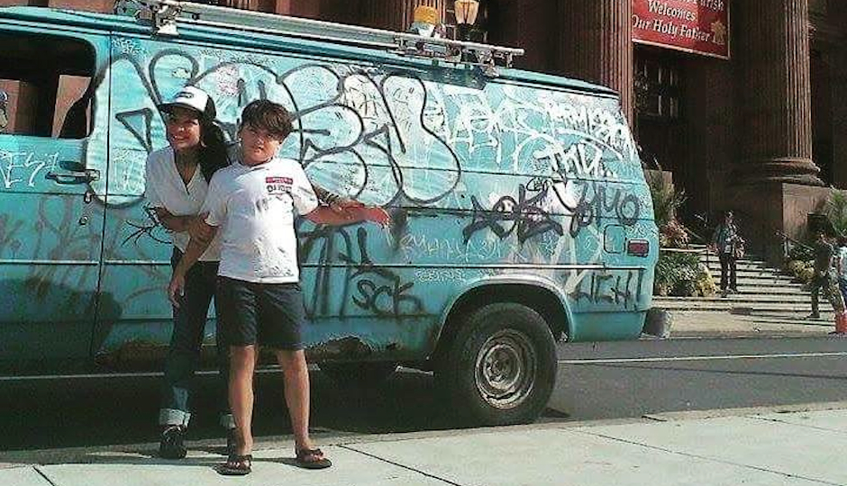 Jennifer Fear Zavala and her son Santino in front of their tamale van.
