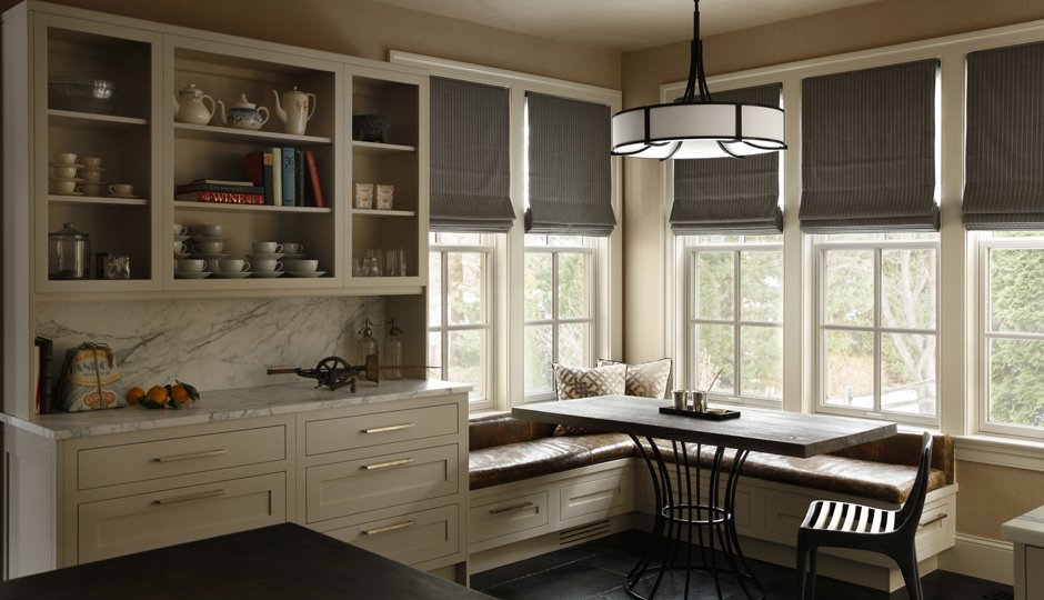 Open cabinets in a Villanova kitchen designed by Ashli Mizell | Photograph by Jason Varney