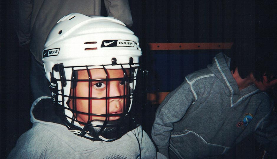 Bobby in hockey gear around age 9. Photograph courtesy of the Hill family.