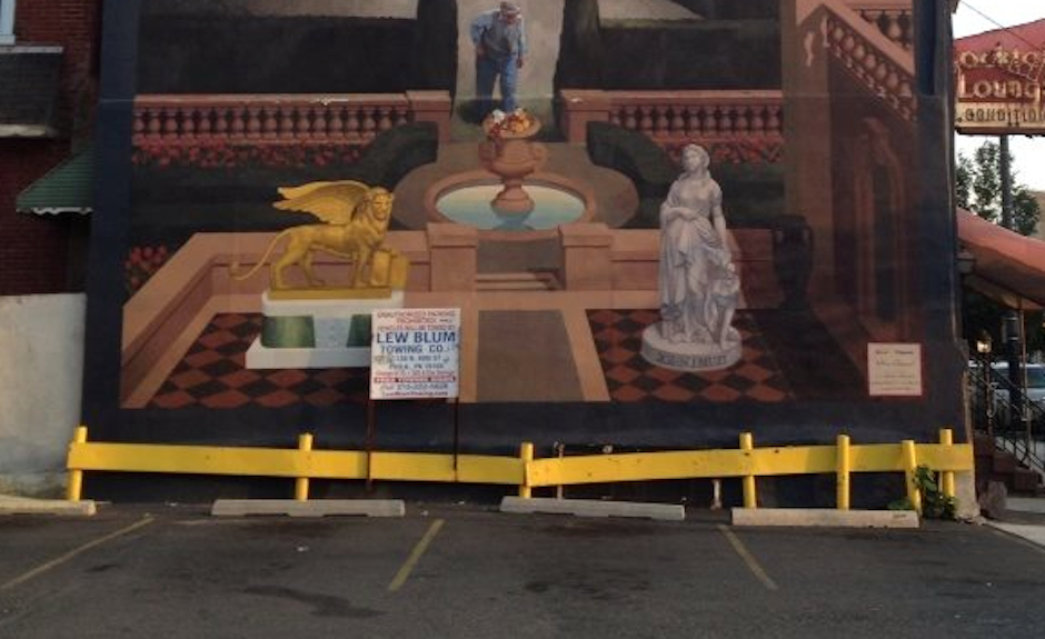 Have some tow sign with your mural. (Photo by Pauly Panda Louis)