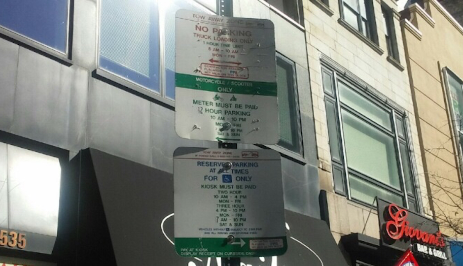 The signage where DeVido parked. (Photo by Megan Sawey)