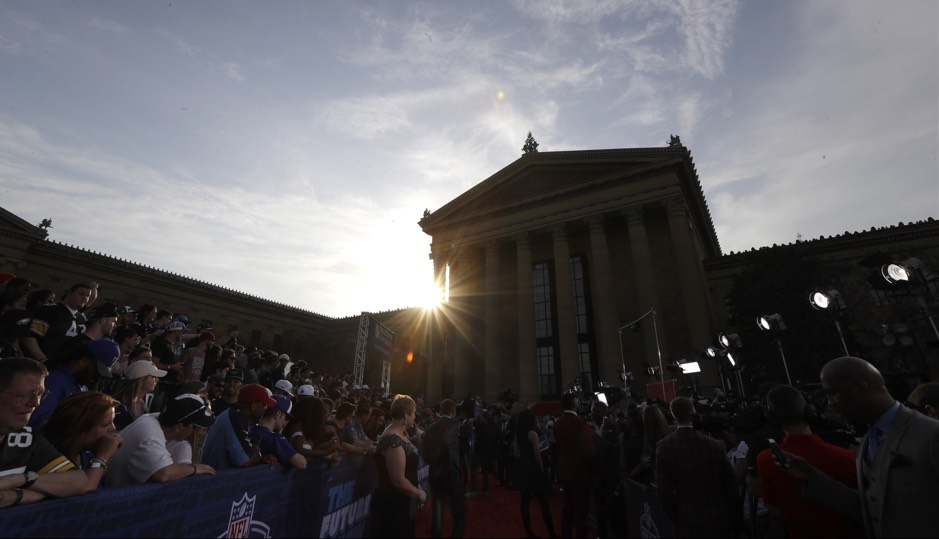 Fans and media gather on the red carpet before the first round of the 2017 NFL football draft, Thursday, April 27, 2017, in Philadelphia. (AP Photo/Julio Cortez)