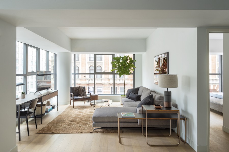 roost east market tour corner unit living room